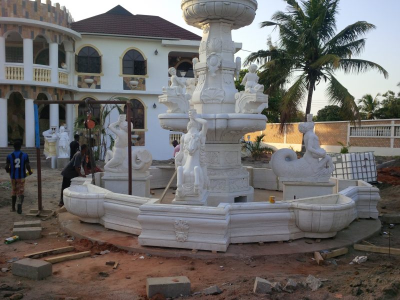 The installation of the large outdoor marble fountain